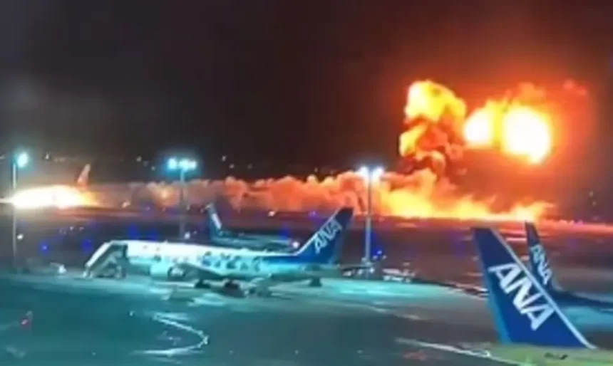 Plane In Flames At Tokyo Airport After Colliding With Another Aircraft