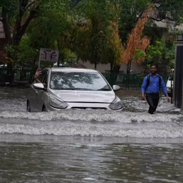 Heavy rain leaves Delhi waterlogged, traffic crawls