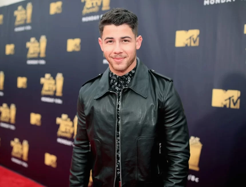 Nick Jonas flees stage after a laser gets aimed at his head at Prague concert Nick Jonas flees stage after a laser gets aimed at his head at Prague concert