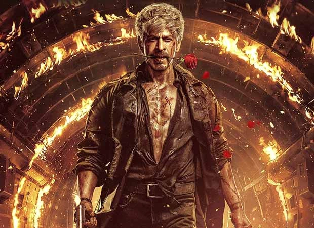 SRK unveils new KING poster with a rose between his lips and bloodied face SRK unveils new KING poster with a rose between his lips and bloodied face